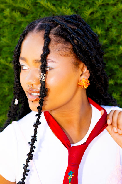 Boucles d'oreilles à clips fleur orange