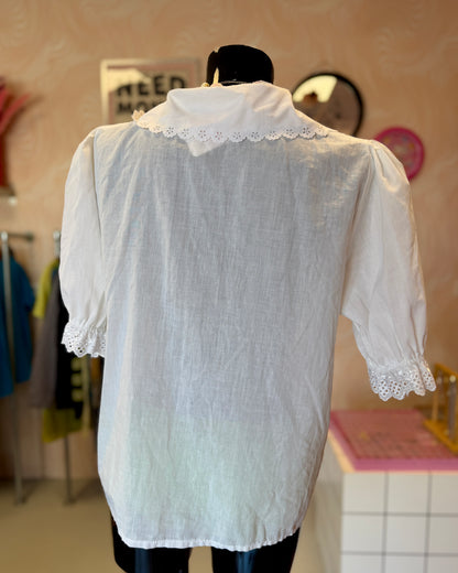 Blouse blanche à manches bouffantes | T. M