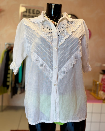 Blouse blanche à manches bouffantes | T. M