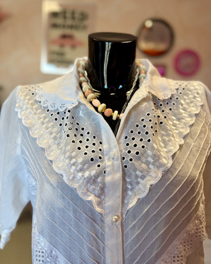 Blouse blanche à manches bouffantes | T. M