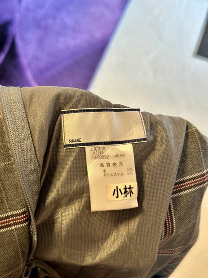 Jupe plissée mi-longue grise à carreaux | T. 32 / 34