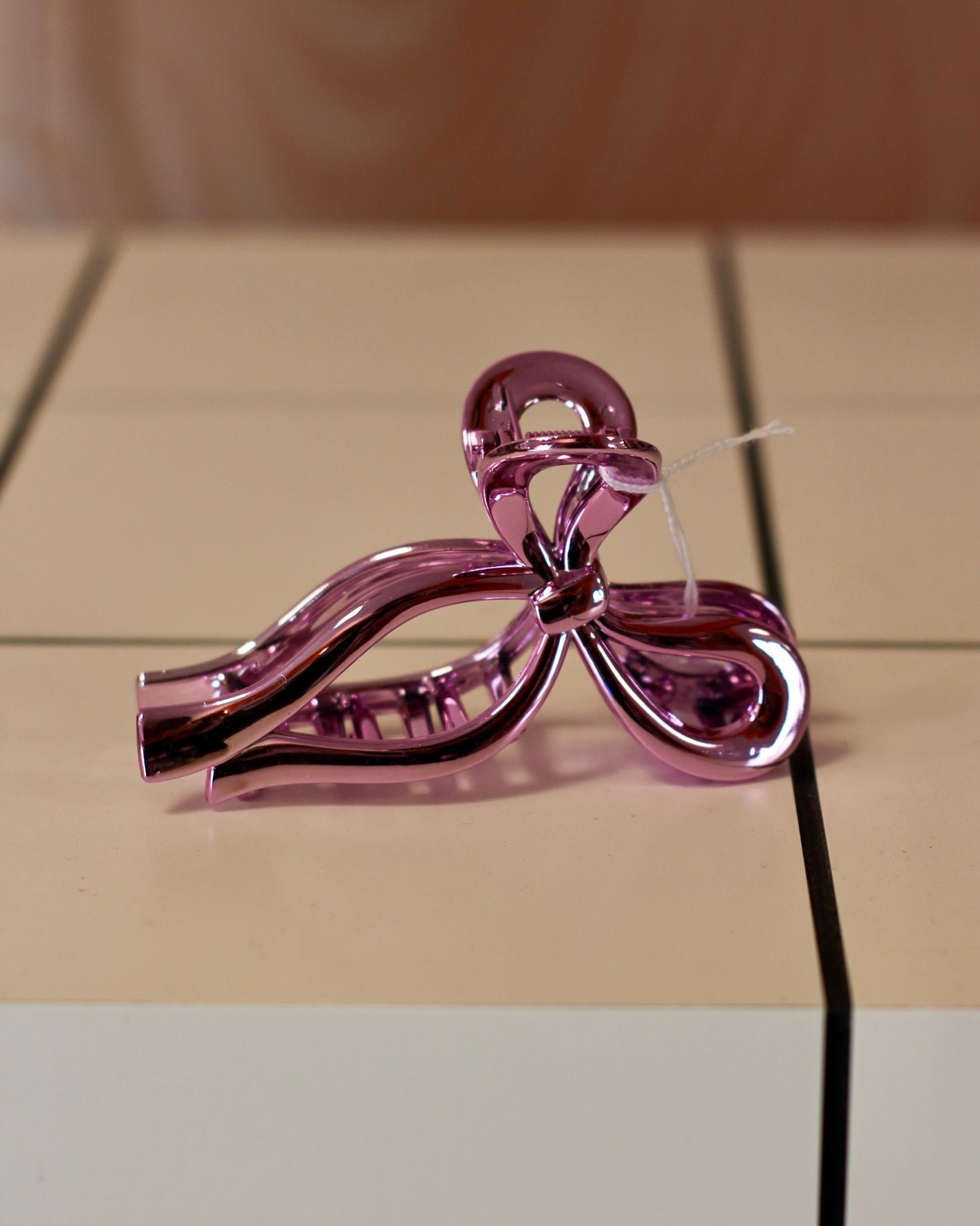 Grande pince à cheveux noeud rose