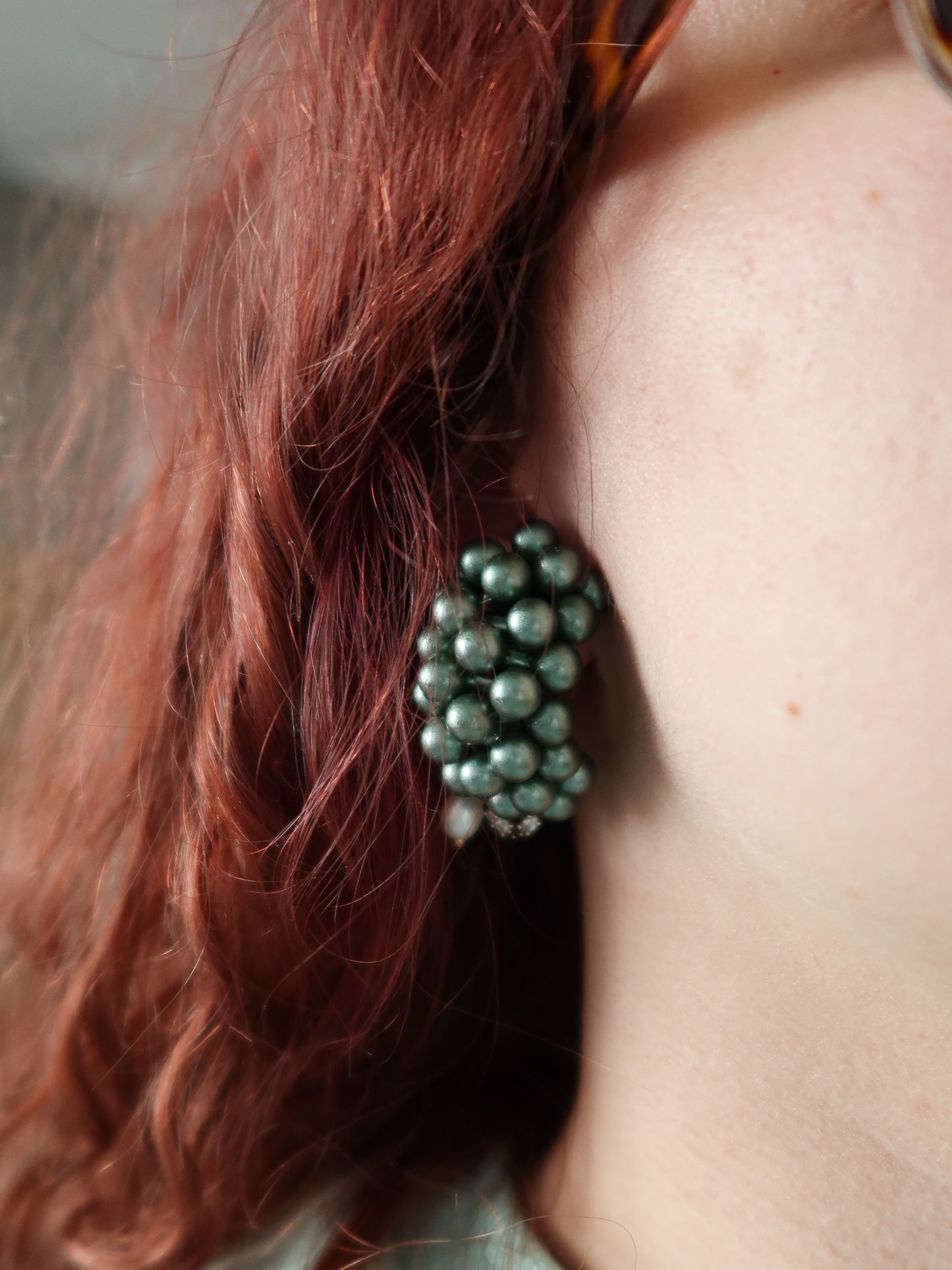 Boucle d'oreille à perles vertes