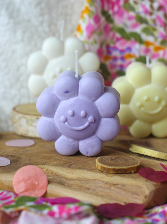 Bougie en forme de fleur souriante - Violet