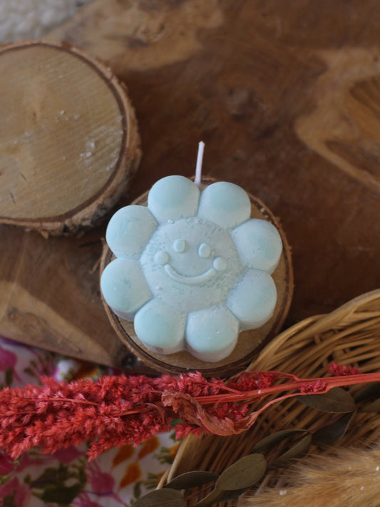 Bougie en forme de fleur souriant - Bleu